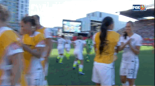Alex Morgan and Sydney Leroux showcase their pre-match handshake